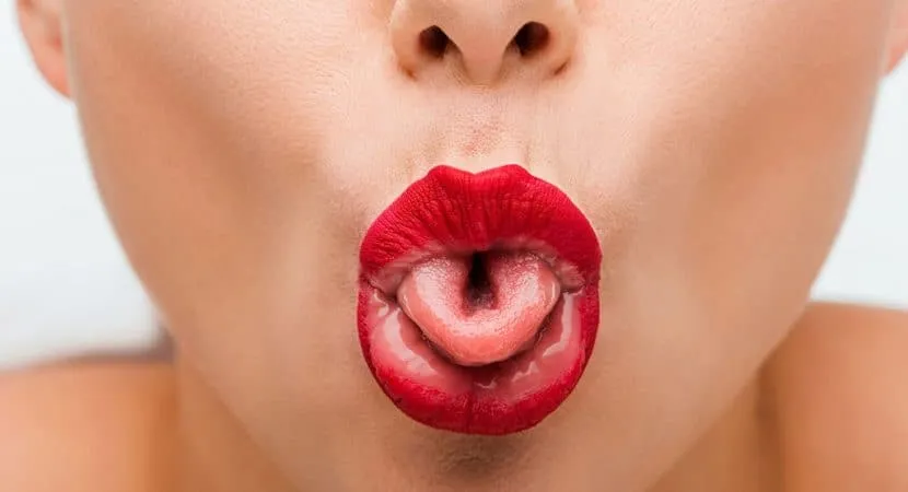 84 percent of the population can curl their tongue